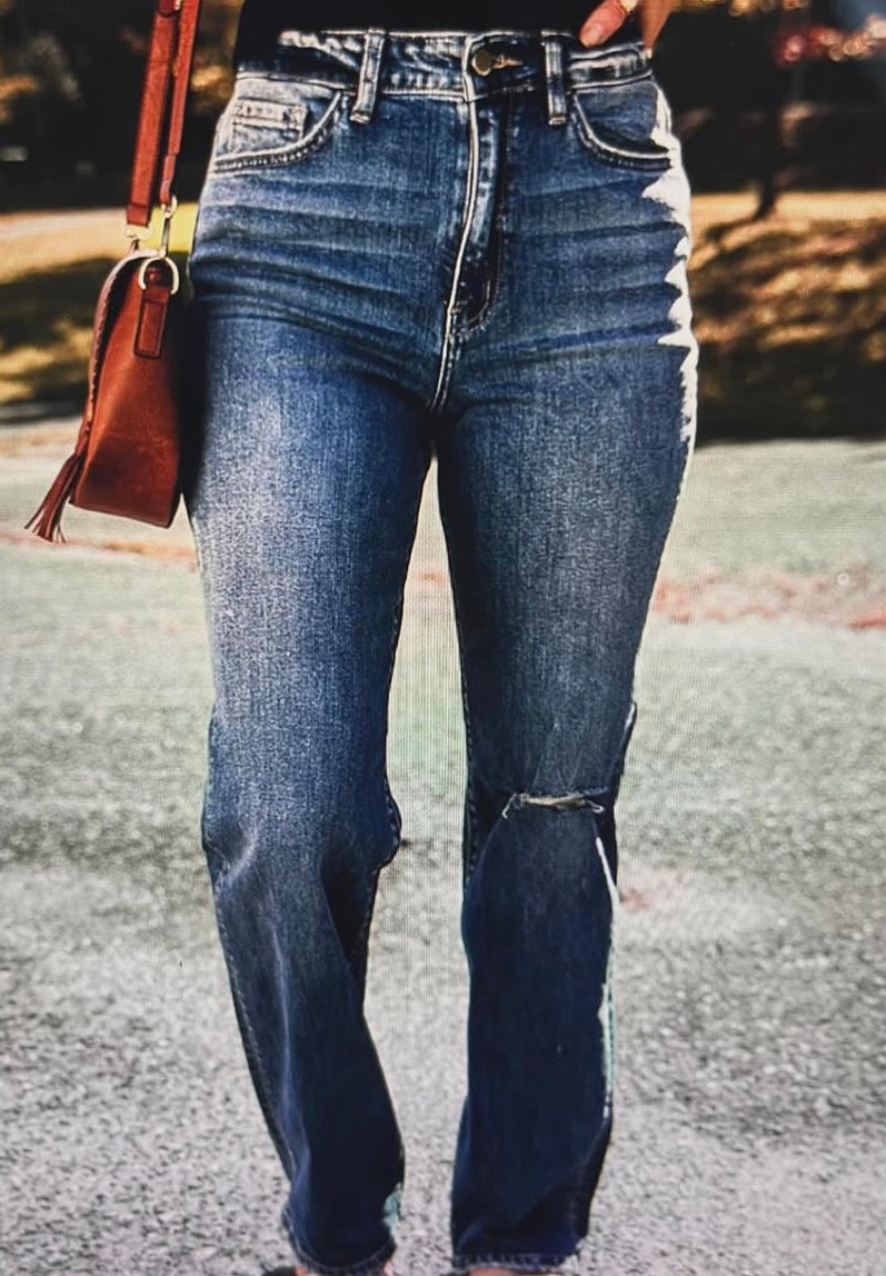 Ripped straight legged jeans