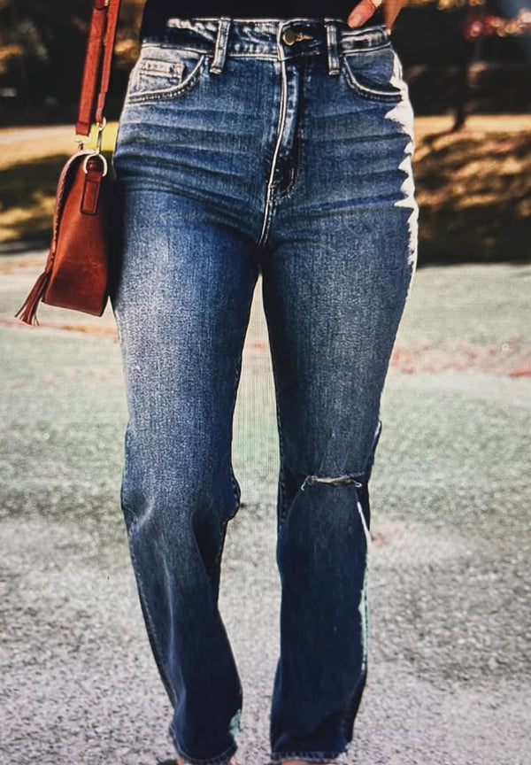 Ripped straight legged jeans